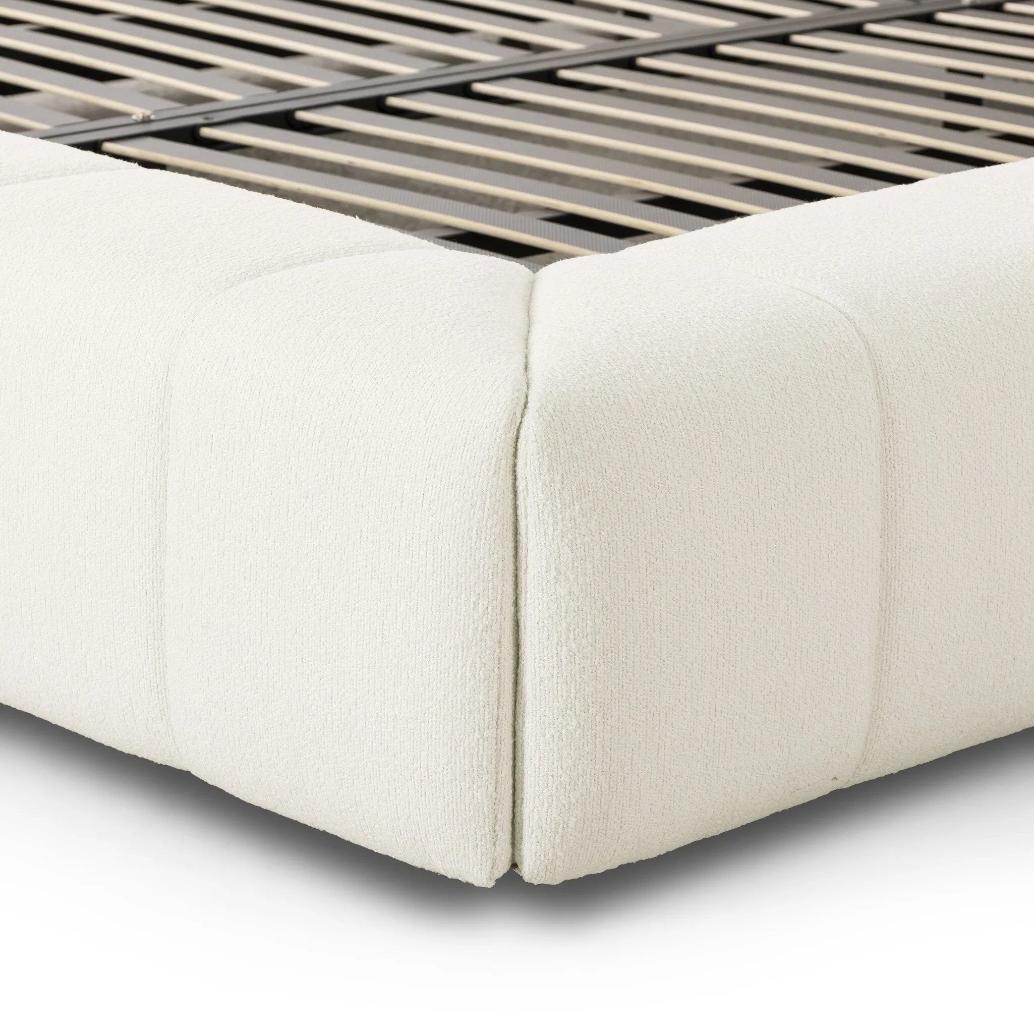 Wide, vertical channeling and low styling speak to the modish Italian influence of this softly textured bed upholstered in cream high-performance fabric. Performance fabrics are specially created to withstand spills, stains, high traffic and wear, ensuring long-term comfort and unmatched durability Amethyst Home provides interior design, new home construction design consulting, vintage area rugs, and lighting in the Newport Beach metro area.