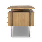 Featuring Lauren Natural Resawn Oak Desk by Four Hands at Amethyst Home. Made from solid oak and reclaimed peroba, a legal-style desk offers major storage with dual cabinetry, including file storage for legal and letter-size documents. A floating top and iron legs keep the look modern and light. This piece is designed in collaboration with Thomas Bina. F. Amethyst Home provides interior design, new home construction design consulting, vintage area rugs, and lighting in the Laguna Beach metro area.