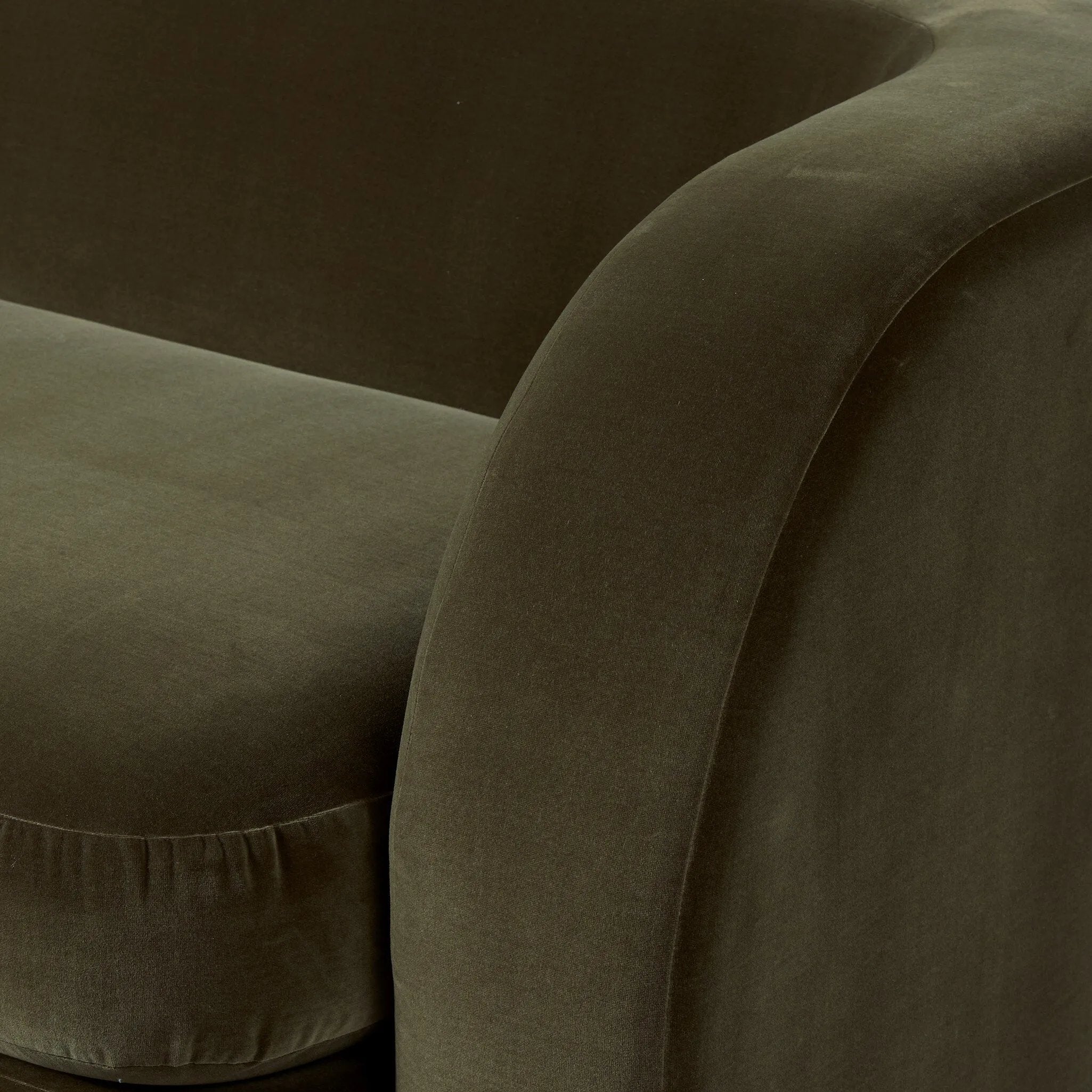 Lounge or entertain on this velvety bench-style sofa. The solid wood frame features a gentle curve at the front, while the olive performance fabric introduces rich, unexpected color to the living area. Performance fabrics are specially created to withstand spills, stains, high traffic and wear, ensuring long-term comfort and unmatched durability. Amethyst Home provides interior design, new home construction design consulting, vintage area rugs, and lighting in the Calabasas metro area.