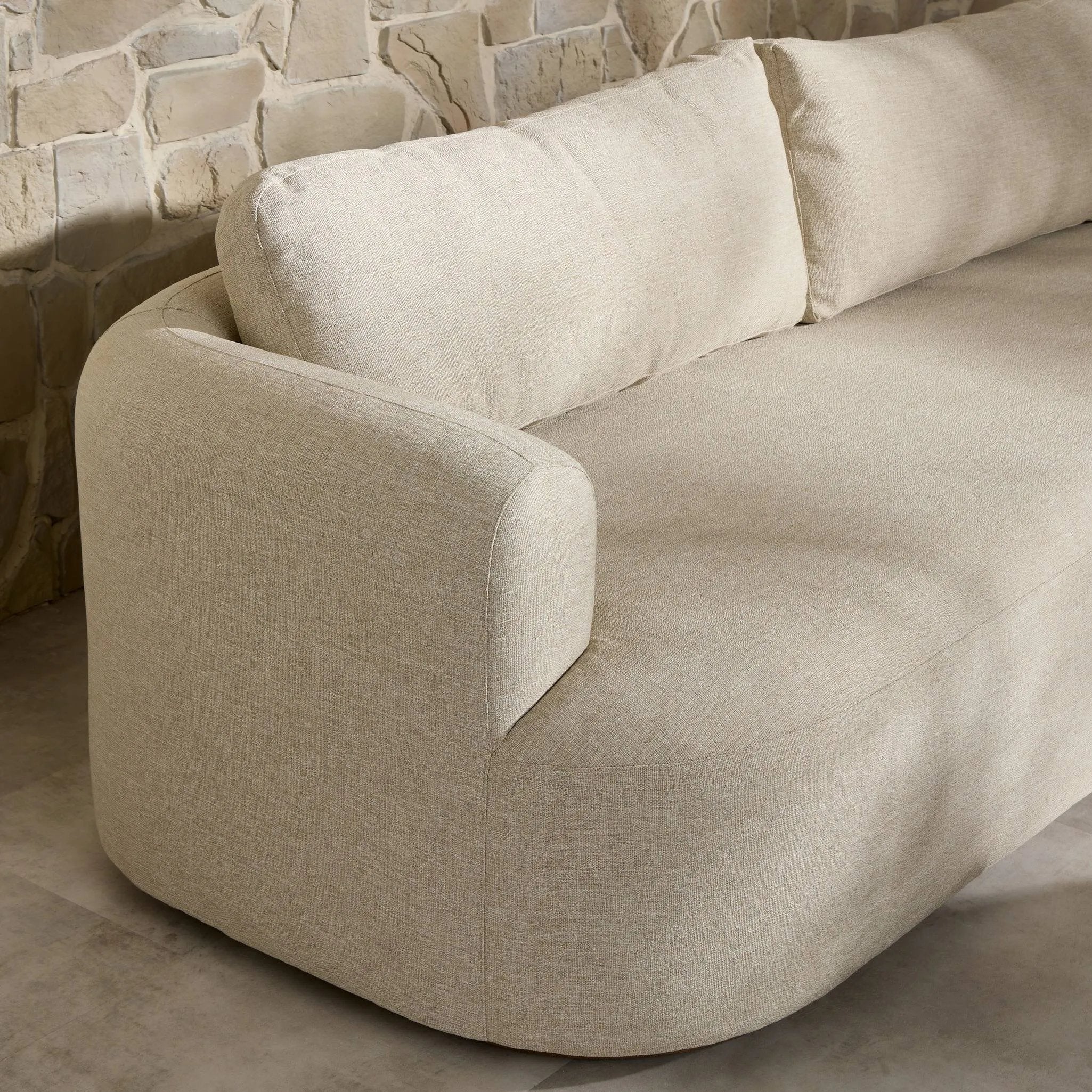 Settle into comfort outdoors. An inviting outdoor sofa features a rounded, inflated silhouette crafted from solid FSC®-certified teak. Finished in high-performance upholstery, with welcoming wide arms and loose back cushions for easy lounging. Cover or store indoors during inclement weather and when not in use Amethyst Home provides interior design, new home construction design consulting, vintage area rugs, and lighting in the Portland metro area.