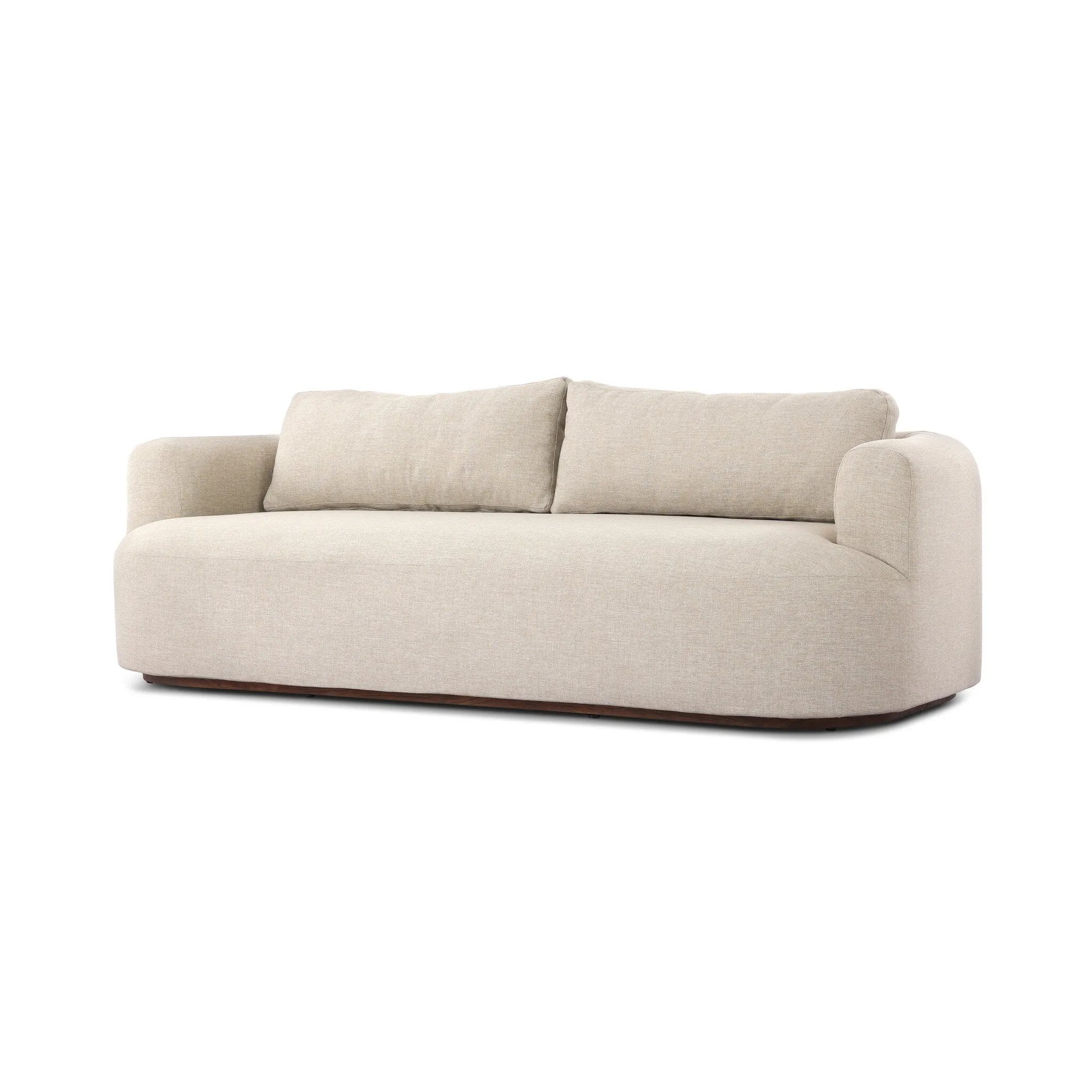Settle into comfort outdoors. An inviting outdoor sofa features a rounded, inflated silhouette crafted from solid FSC®-certified teak. Finished in high-performance upholstery, with welcoming wide arms and loose back cushions for easy lounging. Cover or store indoors during inclement weather and when not in use Amethyst Home provides interior design, new home construction design consulting, vintage area rugs, and lighting in the San Diego metro area.