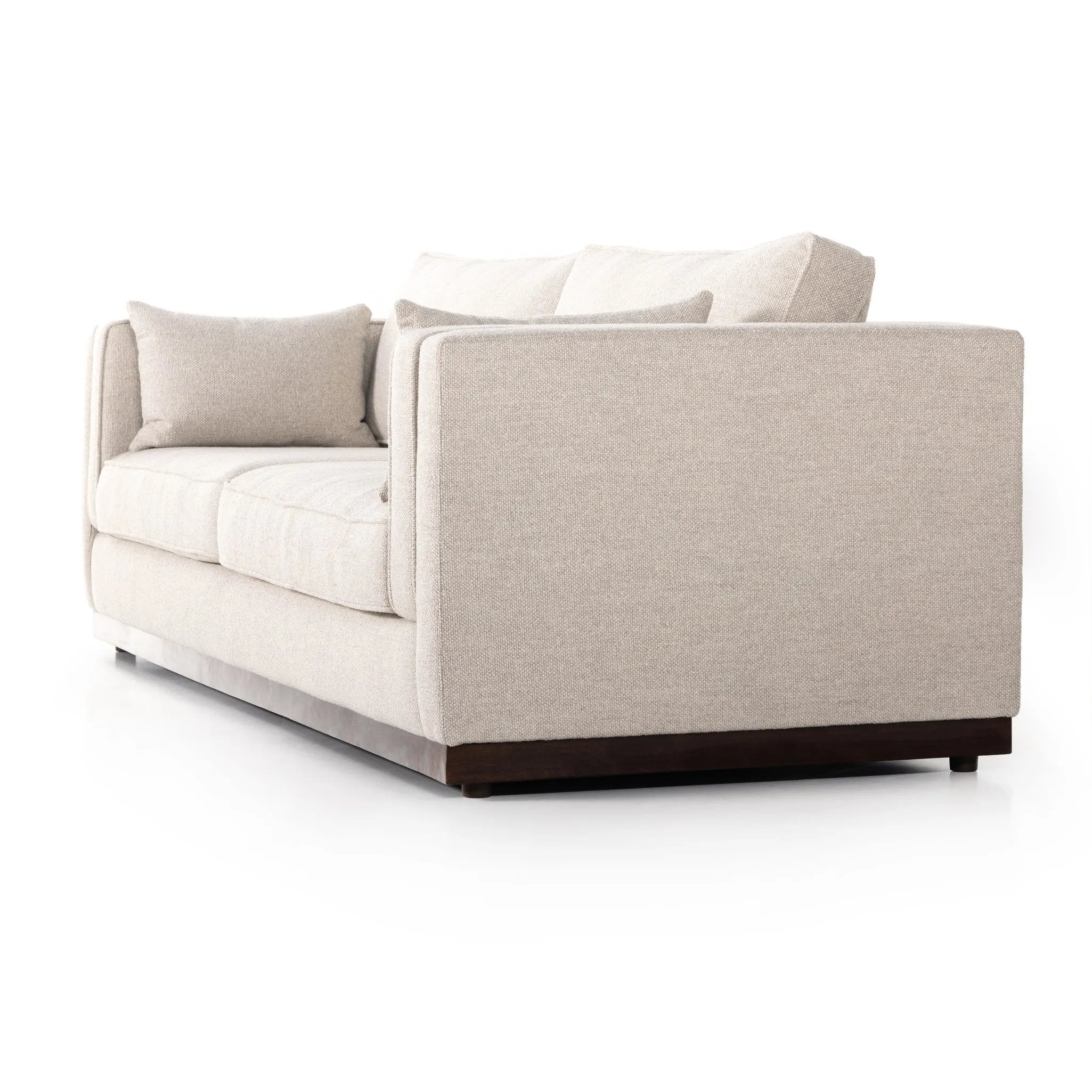 Traditional goes modern. Doubled-stacked arms and cushioning make for a layered look with maximum comfort, while high-performance upholstery is great for everyday lounging. Finished in an auburn walnut, a 360 plinth-style base offers a touch of contrast. Amethyst Home provides interior design, new home construction design consulting, vintage area rugs, and lighting in the Charlotte metro area.