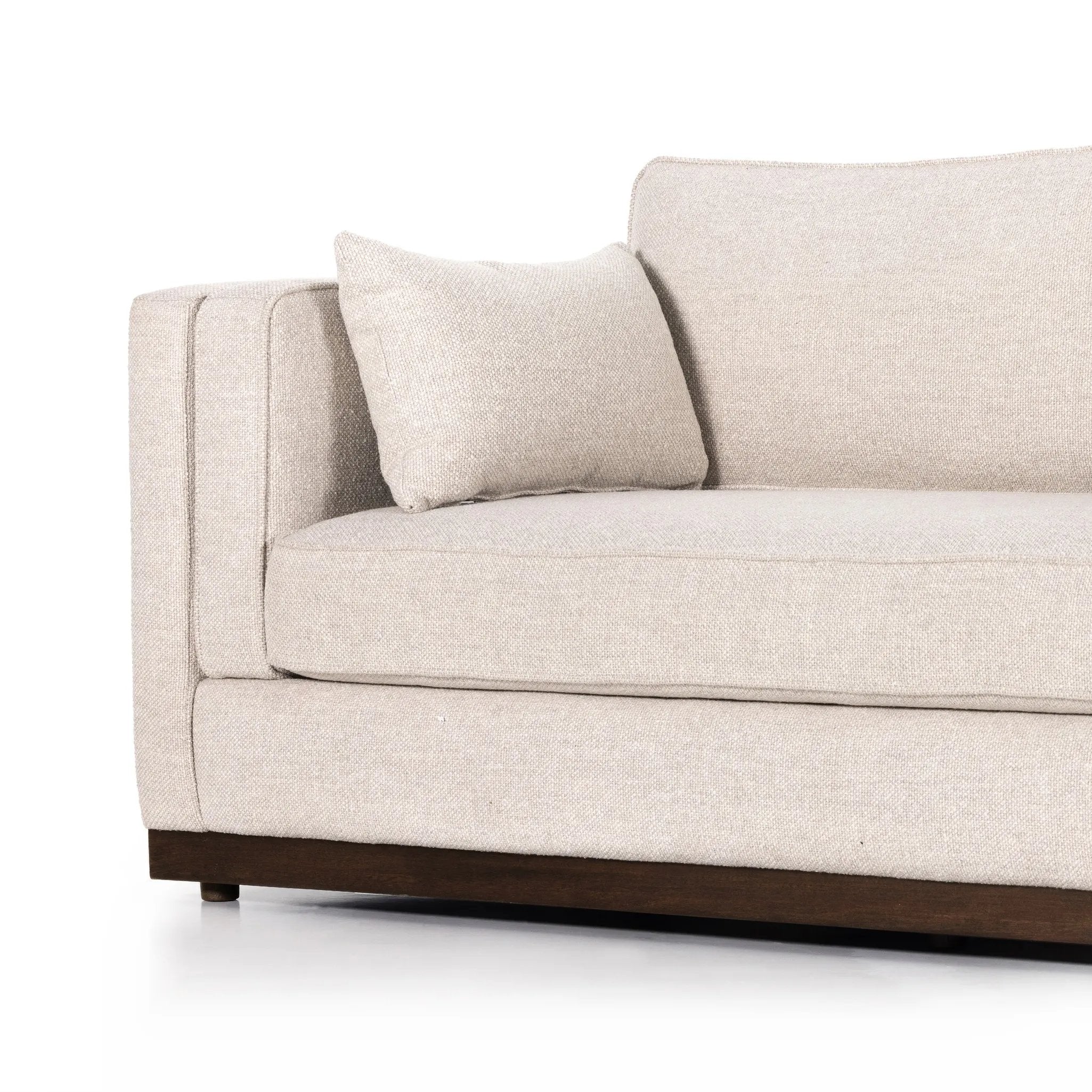 Traditional goes modern. Doubled-stacked arms and cushioning make for a layered look with maximum comfort, while high-performance upholstery is great for everyday lounging. Finished in an auburn walnut, a 360 plinth-style base offers a touch of contrast. Amethyst Home provides interior design, new home construction design consulting, vintage area rugs, and lighting in the Houston metro area.