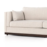 Traditional goes modern. Doubled-stacked arms and cushioning make for a layered look with maximum comfort, while high-performance upholstery is great for everyday lounging. Finished in an auburn walnut, a 360 plinth-style base offers a touch of contrast. Amethyst Home provides interior design, new home construction design consulting, vintage area rugs, and lighting in the Kansas City metro area.