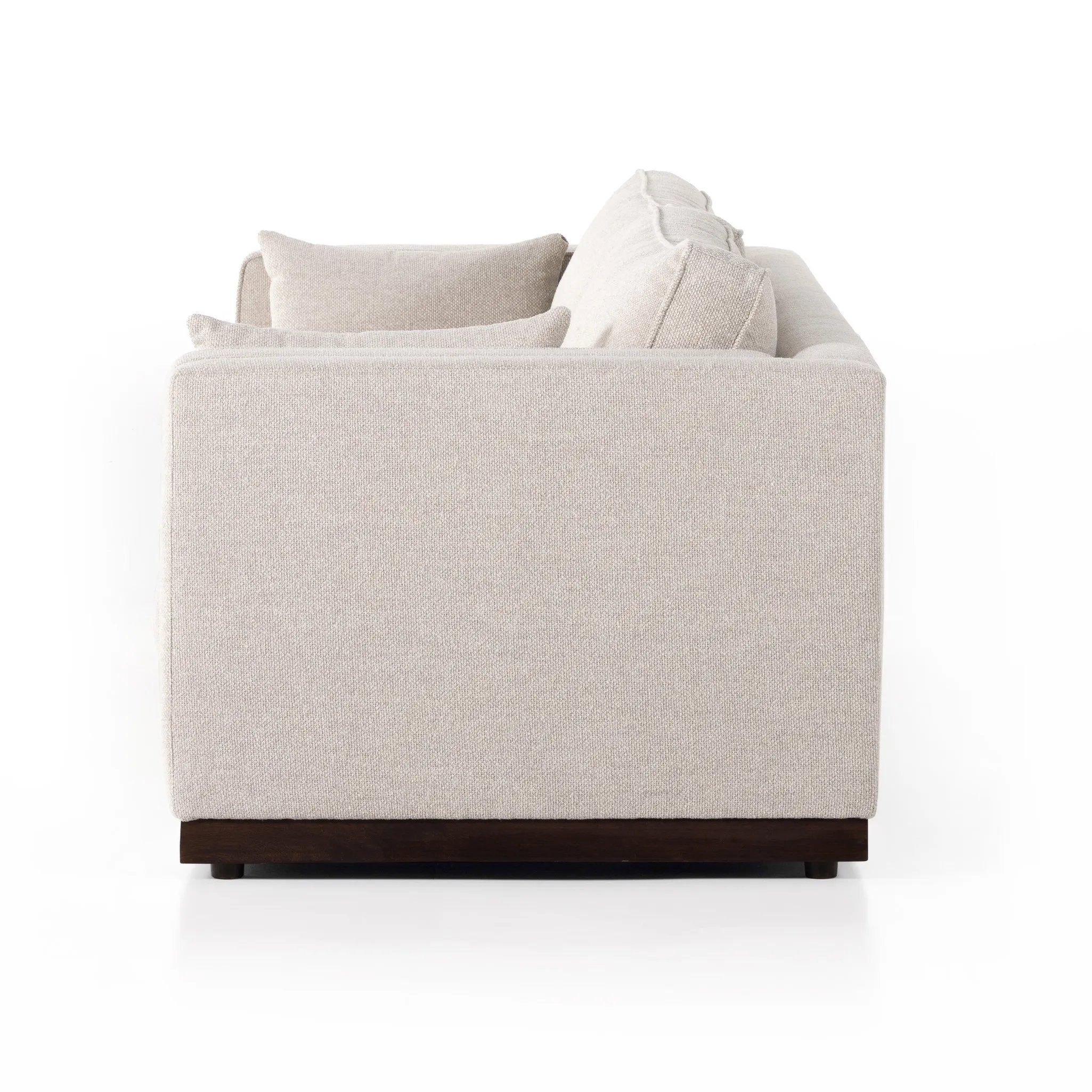 Traditional goes modern. Doubled-stacked arms and cushioning make for a layered look with maximum comfort, while high-performance upholstery is great for everyday lounging. Finished in an auburn walnut, a 360 plinth-style base offers a touch of contrast. Amethyst Home provides interior design, new home construction design consulting, vintage area rugs, and lighting in the Monterey metro area.