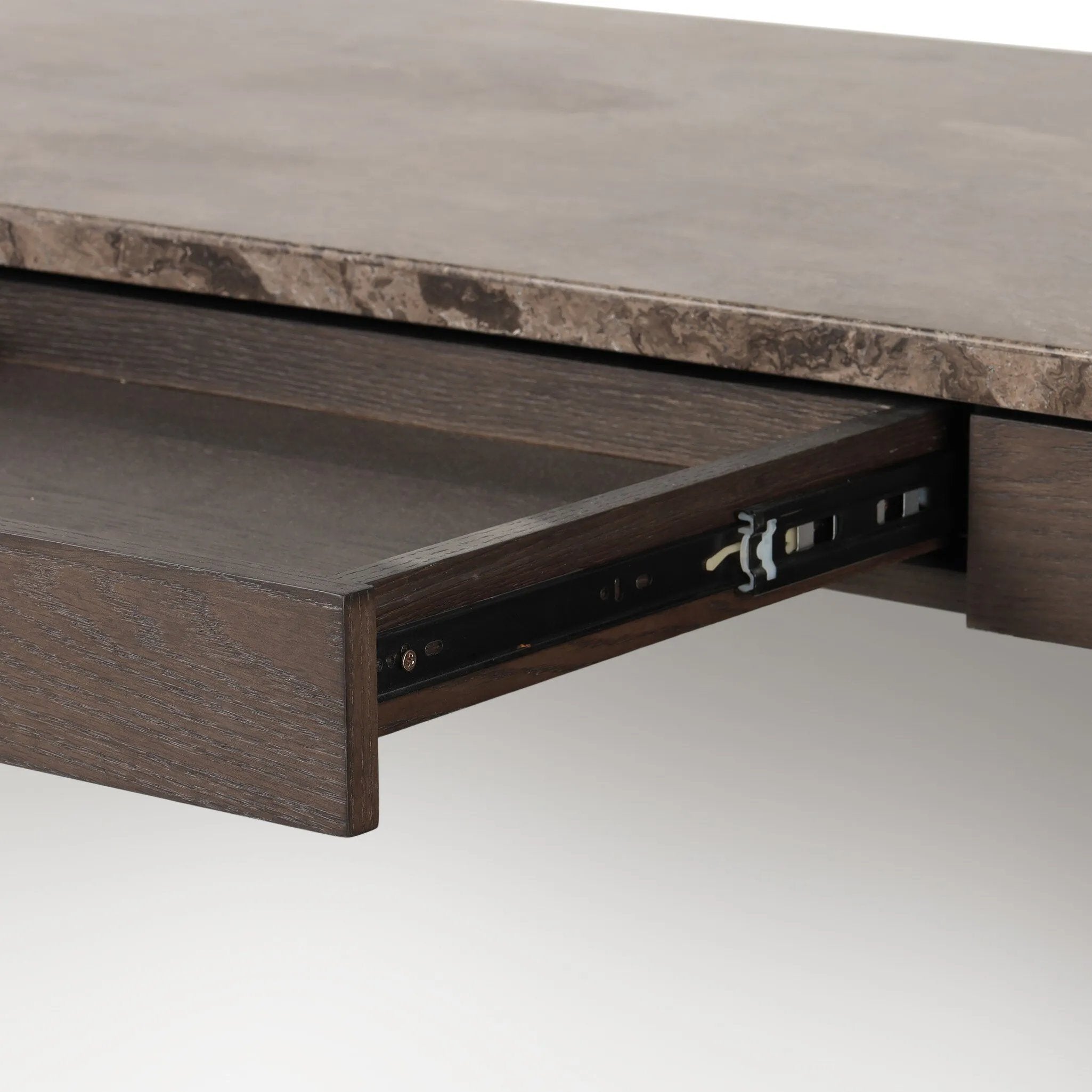 Featuring Lawson Brown Oak Veneer Desk by Four Hands at Amethyst Home. The traditional writing desk, elevated with mixed materials. Vein-rich marble tops an angular brown oak base, with two pencil drawers for storage. Overall Dimensions: 73.50"w x 28.00"d x 30.00"h. Amethyst Home provides interior design, new home construction design consulting, vintage area rugs, and lighting in the Houston metro area.