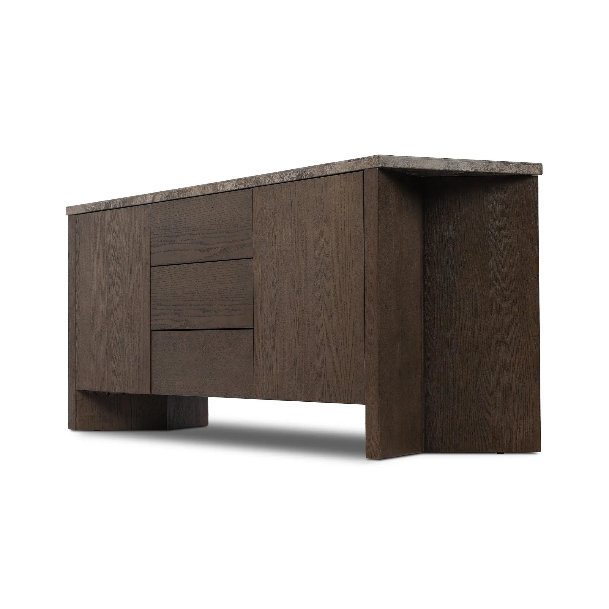 The traditional media console, elevated with mixed materials. Vein-rich marble tops an angular brown oak base, with three drawers flanked by cabinets for storage. Rear cutouts for cord management.As enthusiasts of wabi sabi design at Amethyst, we love the designer inspired Lawson Media Console. Amethyst Home provides interior design, new home construction design consulting, vintage area rugs, and lighting in the Charlotte metro area.