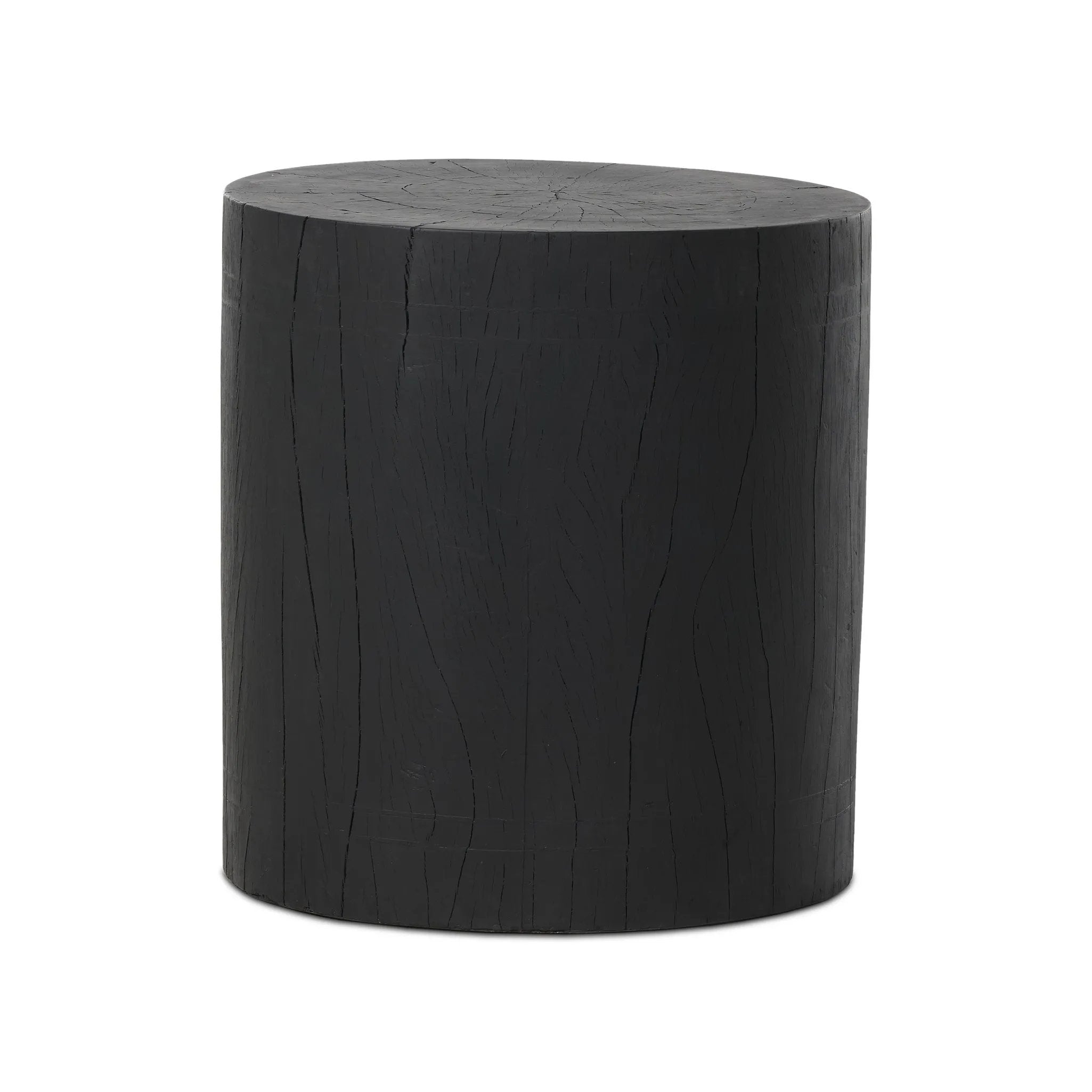 Ground any room with a style inspired by the beautiful simplicity of nature. Made of black-finished resin, the form for this special piece is molded from a tree trunk that's been cut into a circle, then cast in resin to recreate the same  texture of the trunk, even the saw marks where it was cut — talk about a true statement piece Amethyst Home provides interior design, new home construction design consulting, vintage area rugs, and lighting in the Boston metro area.