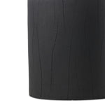 Ground any room with a style inspired by the beautiful simplicity of nature. Made of black-finished resin, the form for this special piece is molded from a tree trunk that's been cut into a circle, then cast in resin to recreate the same  texture of the trunk, even the saw marks where it was cut — talk about a true statement piece Amethyst Home provides interior design, new home construction design consulting, vintage area rugs, and lighting in the Houston metro area.
