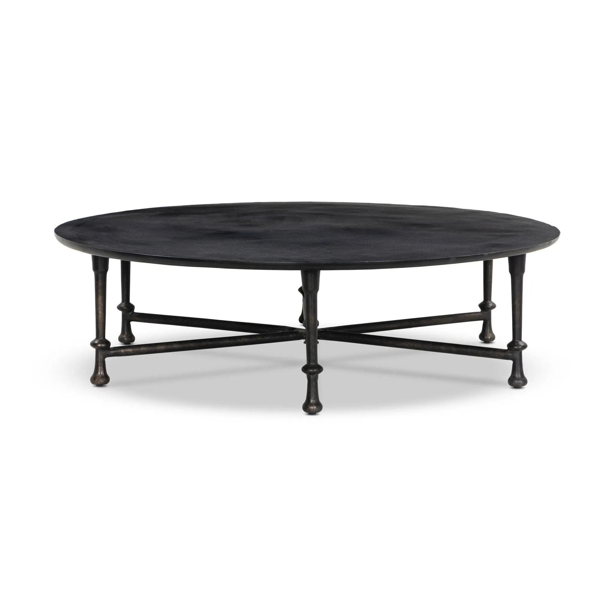 Cast aluminum shapes this statement outdoor coffee table. Each of the six legs features turned detailing, finished in a distressed bronze that highlights the subtle movement of the material. A design collaboration by Amber Lewis and Four Hands. This item has limited online distribution and may not be sold on websites without prior approval. Amethyst Home provides interior design, new home construction design consulting, vintage area rugs, and lighting in the Salt Lake City metro area.