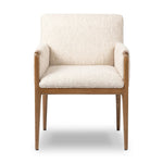 Featuring Ledger Somerton Ash Dining Chair by Four Hands at Amethyst Home. A box-profile dining chair that’s all about comfort. Exposed oak legs flow seamlessly into the chair's upholstered arms, for a seamless look. Performance fabrics are specially created to withstand spills, stains, high traffic and wear, ensuring long-term comfort and unmatched durab. Amethyst Home provides interior design, new home construction design consulting, vintage area rugs, and lighting in the Los Angeles metro area.