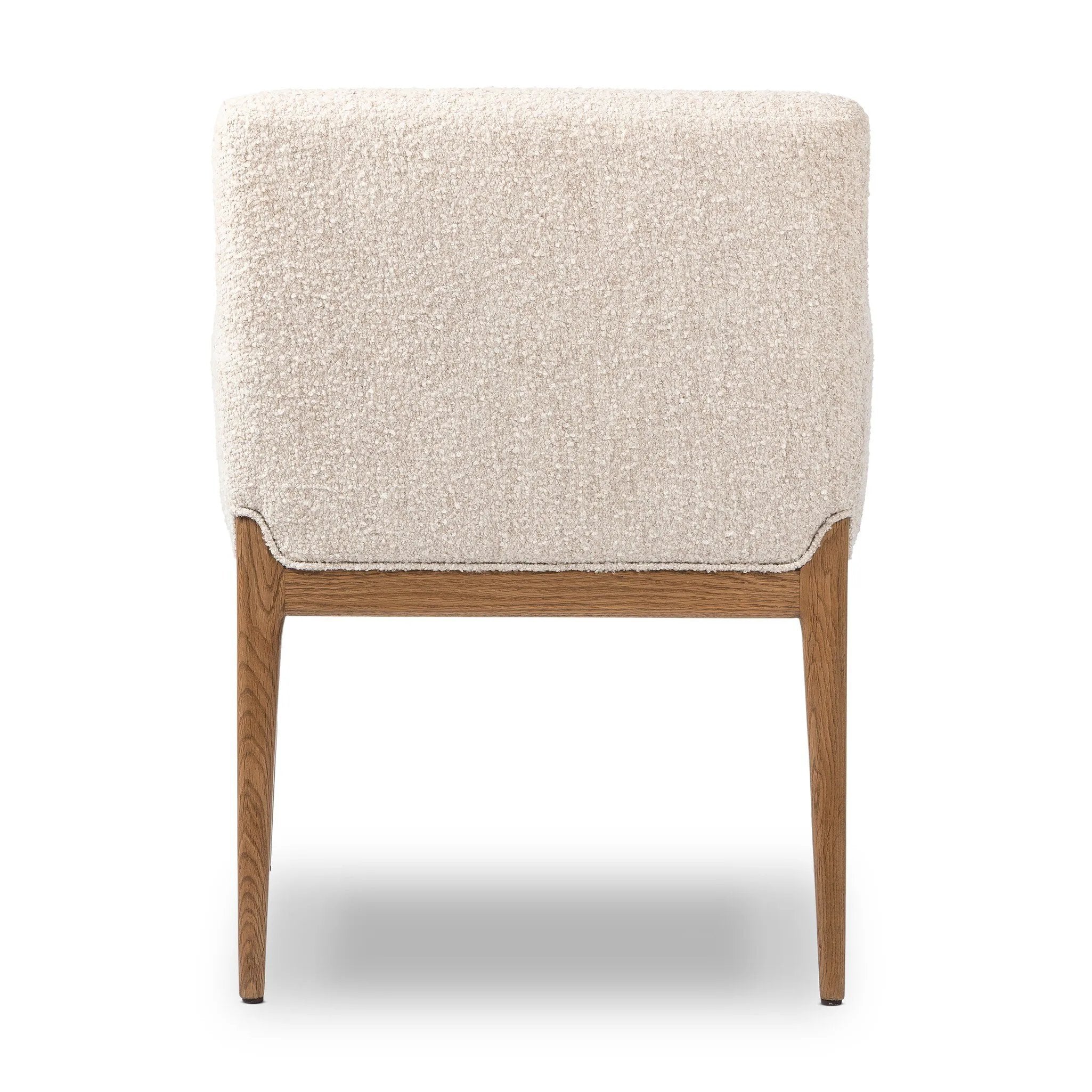 Featuring Ledger Somerton Ash Dining Chair by Four Hands at Amethyst Home. A box-profile dining chair that’s all about comfort. Exposed oak legs flow seamlessly into the chair's upholstered arms, for a seamless look. Performance fabrics are specially created to withstand spills, stains, high traffic and wear, ensuring long-term comfort and unmatched durabil. Amethyst Home provides interior design, new home construction design consulting, vintage area rugs, and lighting in the Nashville metro area.