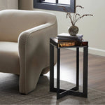 An airy, angular base of charcoal-burnished iron supports a squared tabletop of amber cast glass, perfectly sized to keep your drink or book within reach Amethyst Home provides interior design, new home construction design consulting, vintage area rugs, and lighting in the Charlotte metro area.