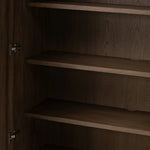 Made from rustic-finished oak with a plinth-style base, clean angles and linear reeding define this midcentury-spirited cabinet. Fully finished interior for a beautiful look inside and out. Designed in partnership with longtime Four Hands collaborator Thomas Bina and Brazilian designer Ronald Sasson. Amethyst Home provides interior design, new home construction design consulting, vintage area rugs, and lighting in the Newport Beach metro area.