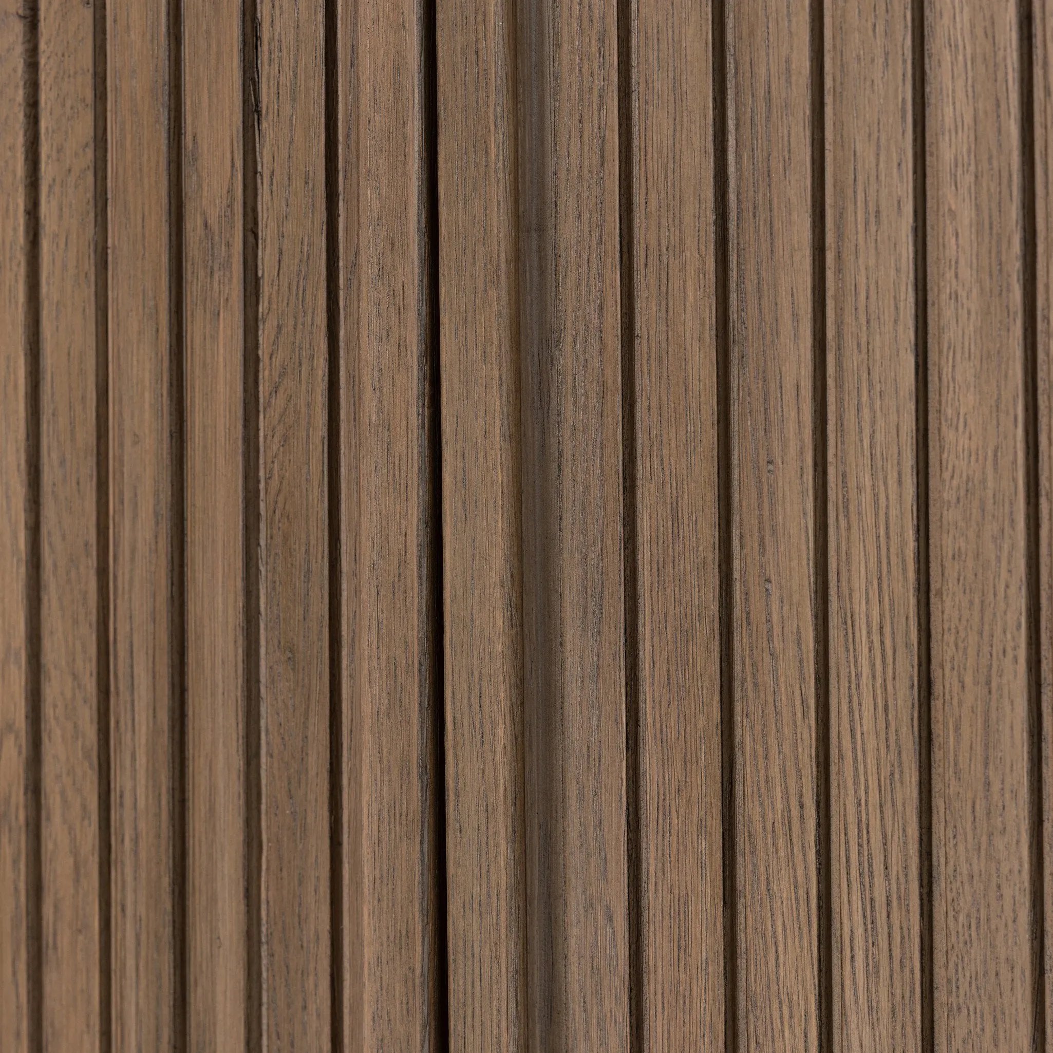 Made from rustic-finished oak with a plinth-style base, clean angles and linear reeding define this midcentury-spirited cabinet. Fully finished interior for a beautiful look inside and out. Designed in partnership with longtime Four Hands collaborator Thomas Bina and Brazilian designer Ronald Sasson. Amethyst Home provides interior design, new home construction design consulting, vintage area rugs, and lighting in the Tampa metro area.