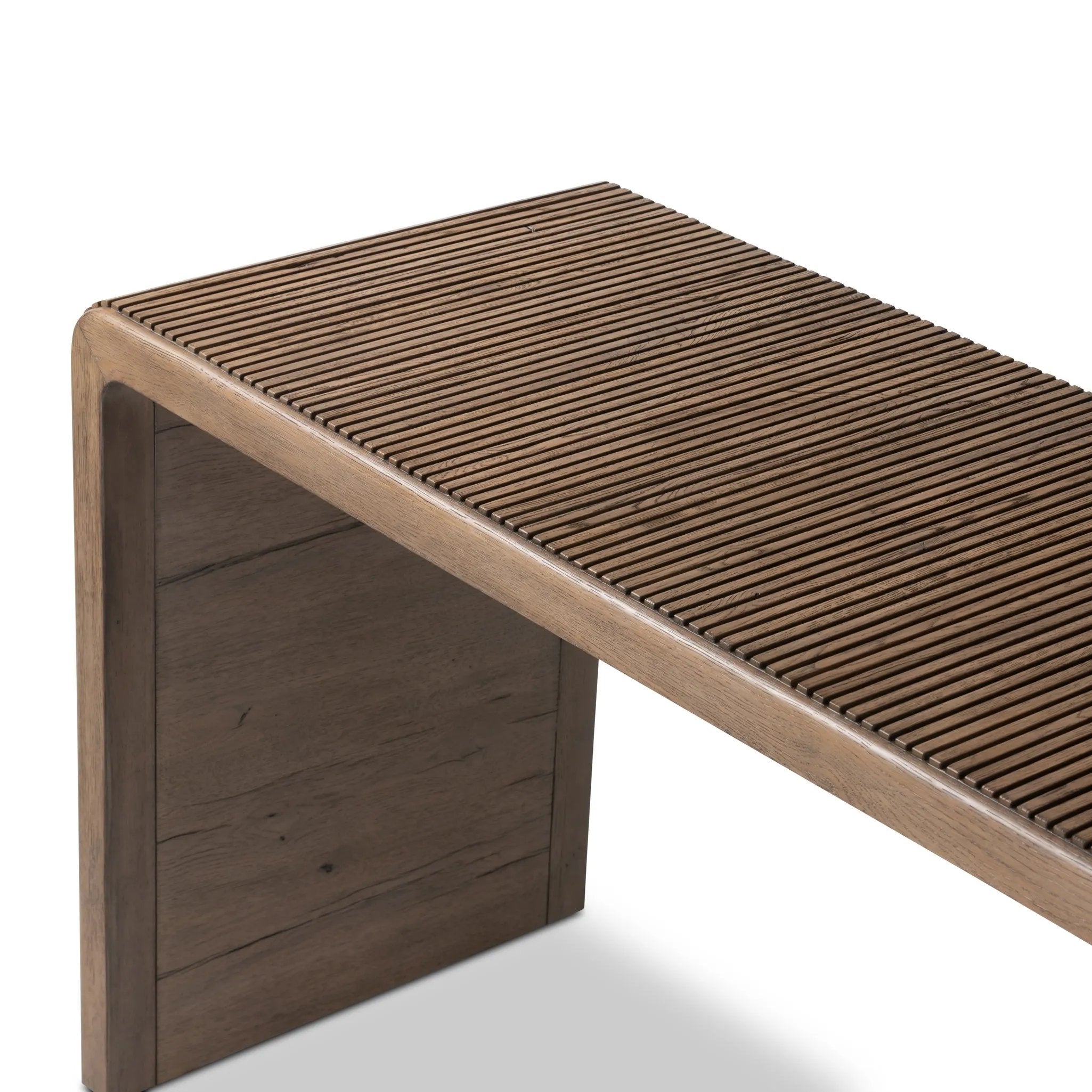 Featuring Leo Rustic Grey Console Table by Four Hands at Amethyst Home. Grey-finished oak shapes an elongated console table, rich with reeding. Subtly rounded edges reflect Brazilian midcentury inspiration behind this crafted minimalist piece. Designed in partnership with longtime Four Hands collaborator Thomas Bina and designer Ronald Sasson.Overall Dime. Amethyst Home provides interior design, new home construction design consulting, vintage area rugs, and lighting in the Kansas City metro area.