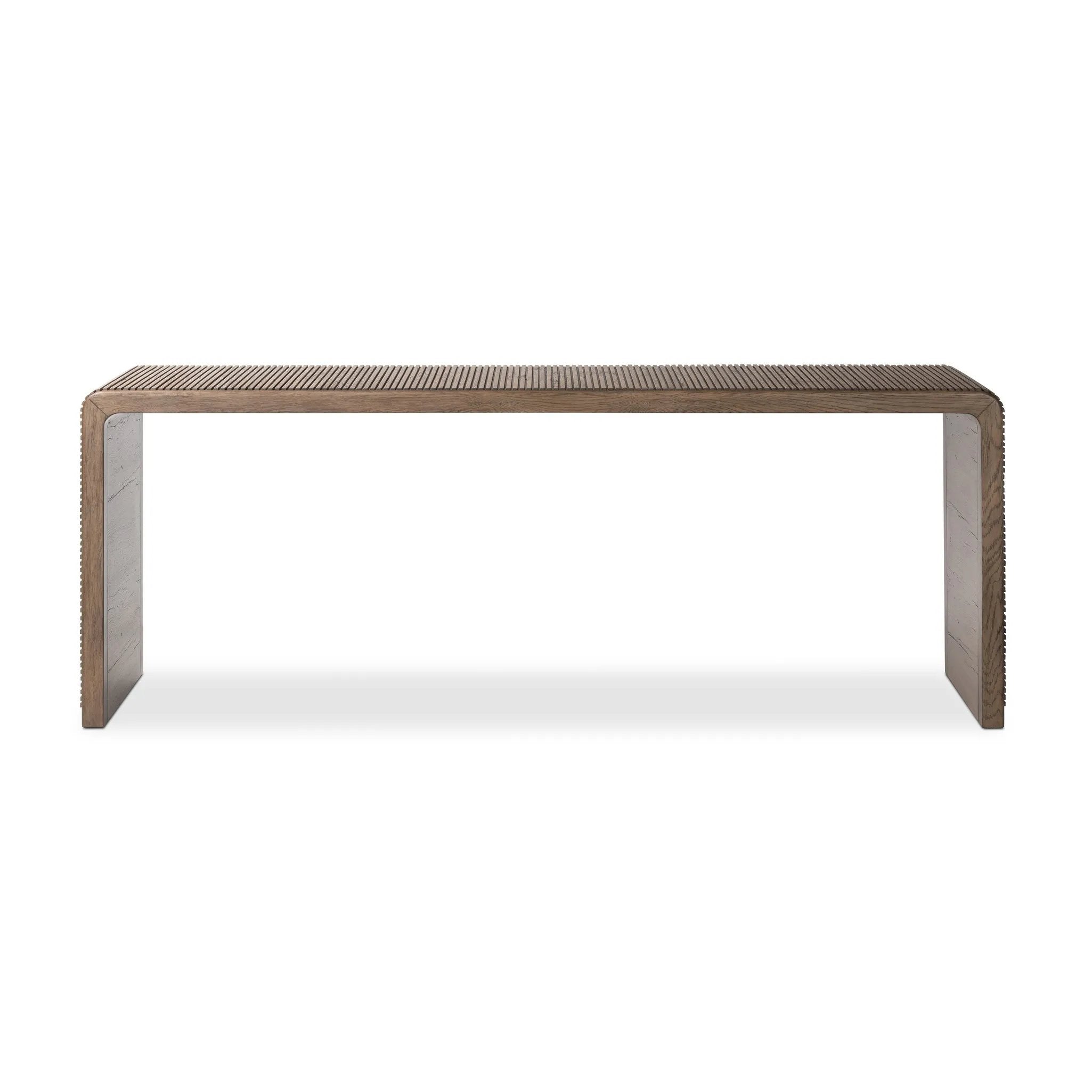 Grey-finished oak shapes an elongated console table, rich with reeding. Subtly rounded edges reflect Brazilian midcentury inspiration behind this crafted minimalist piece. Designed in partnership with longtime Four Hands collaborator Thomas Bina and designer Ronald Sasson Amethyst Home provides interior design, new home construction design consulting, vintage area rugs, and lighting in the Salt Lake City metro area.