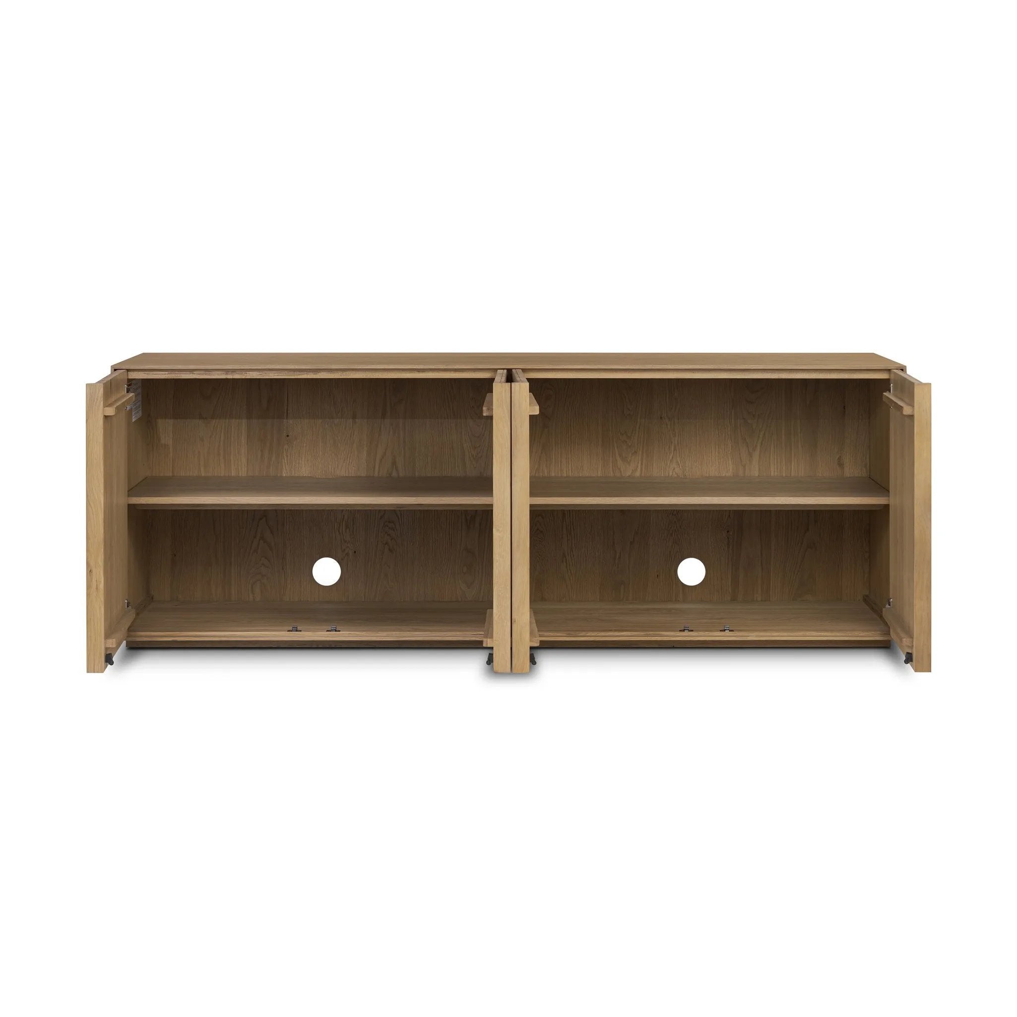 Made from rustic-finished oak with a plinth-style base, clean angles and linear reeding define this midcentury-spirited sideboard. Fully finished interior for a beautiful look inside and out. Designed in partnership with longtime Four Hands collaborator Thomas Bina and Brazilian designer Ronald Sasson Amethyst Home provides interior design, new home construction design consulting, vintage area rugs, and lighting in the Charlotte metro area.