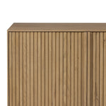 Made from rustic-finished oak with a plinth-style base, clean angles and linear reeding define this midcentury-spirited sideboard. Fully finished interior for a beautiful look inside and out. Designed in partnership with longtime Four Hands collaborator Thomas Bina and Brazilian designer Ronald Sasson Amethyst Home provides interior design, new home construction design consulting, vintage area rugs, and lighting in the Seattle metro area.