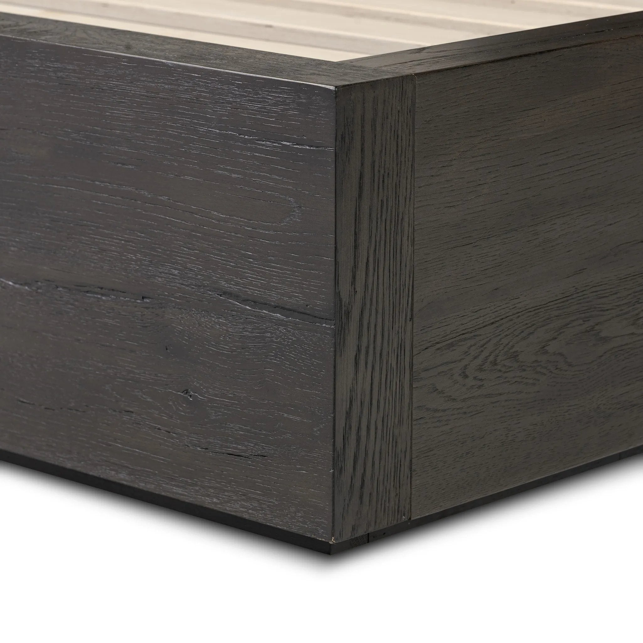 Designed by Thomas Bina and Ronald Sasson, a design partnership blending both modern minimalist and Brazilian influences. Crafted from a mix of solid oak and thick-cut oak veneer, this clean-lined bed features vertical reed detailing on the tall headboard and beautiful horizontal graining on the footboard for extra drama Amethyst Home provides interior design, new home construction design consulting, vintage area rugs, and lighting in the Austin metro area.