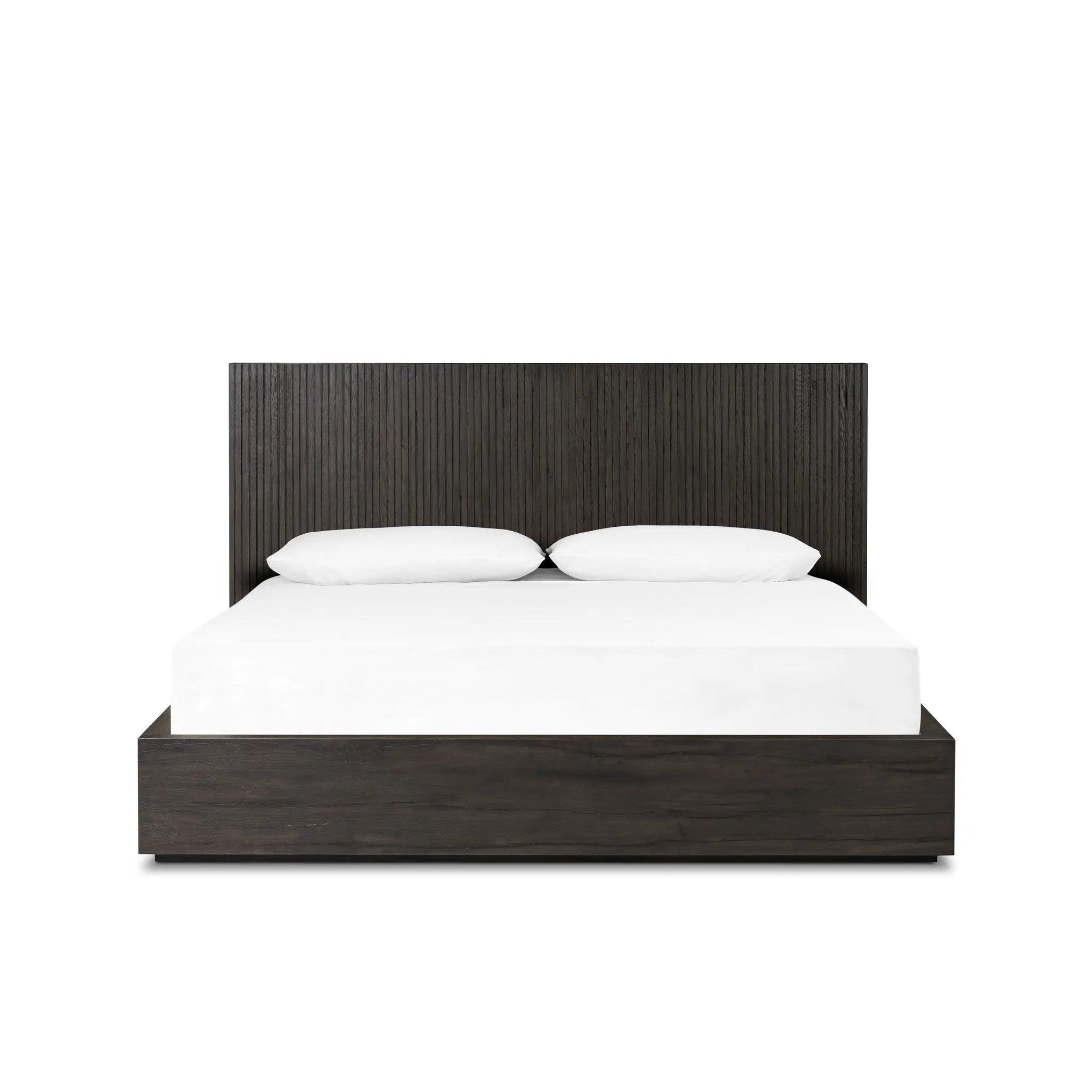 Designed by Thomas Bina and Ronald Sasson, a design partnership blending both modern minimalist and Brazilian influences. Crafted from a mix of solid oak and thick-cut oak veneer, this clean-lined bed features vertical reed detailing on the tall headboard and beautiful horizontal graining on the footboard for extra drama Amethyst Home provides interior design, new home construction design consulting, vintage area rugs, and lighting in the Seattle metro area.