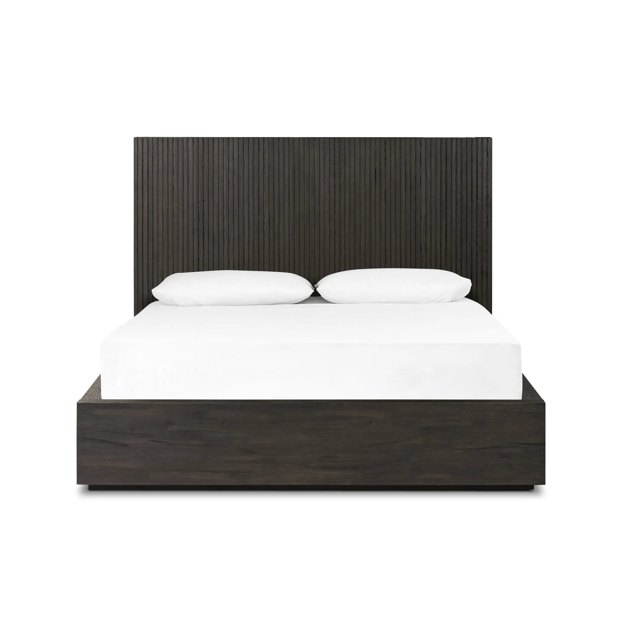 Designed by Thomas Bina and Ronald Sasson, a design partnership blending both modern minimalist and Brazilian influences. Crafted from a mix of solid oak and thick-cut oak veneer, this clean-lined bed features vertical reed detailing on the tall headboard and beautiful horizontal graining on the footboard for extra drama Amethyst Home provides interior design, new home construction design consulting, vintage area rugs, and lighting in the Washington metro area.