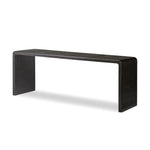 Featuring Leo Smoked Black Console Table by Four Hands at Amethyst Home. Smoked black oak shapes an elongated console table, rich with reeding. Subtly rounded edges reflect Brazilian midcentury inspiration behind this crafted minimalist piece. Designed in partnership with longtime Four Hands collaborator Thomas Bina and designer Ronald Sasson.Overall Di. Amethyst Home provides interior design, new home construction design consulting, vintage area rugs, and lighting in the Winter Garden metro area.