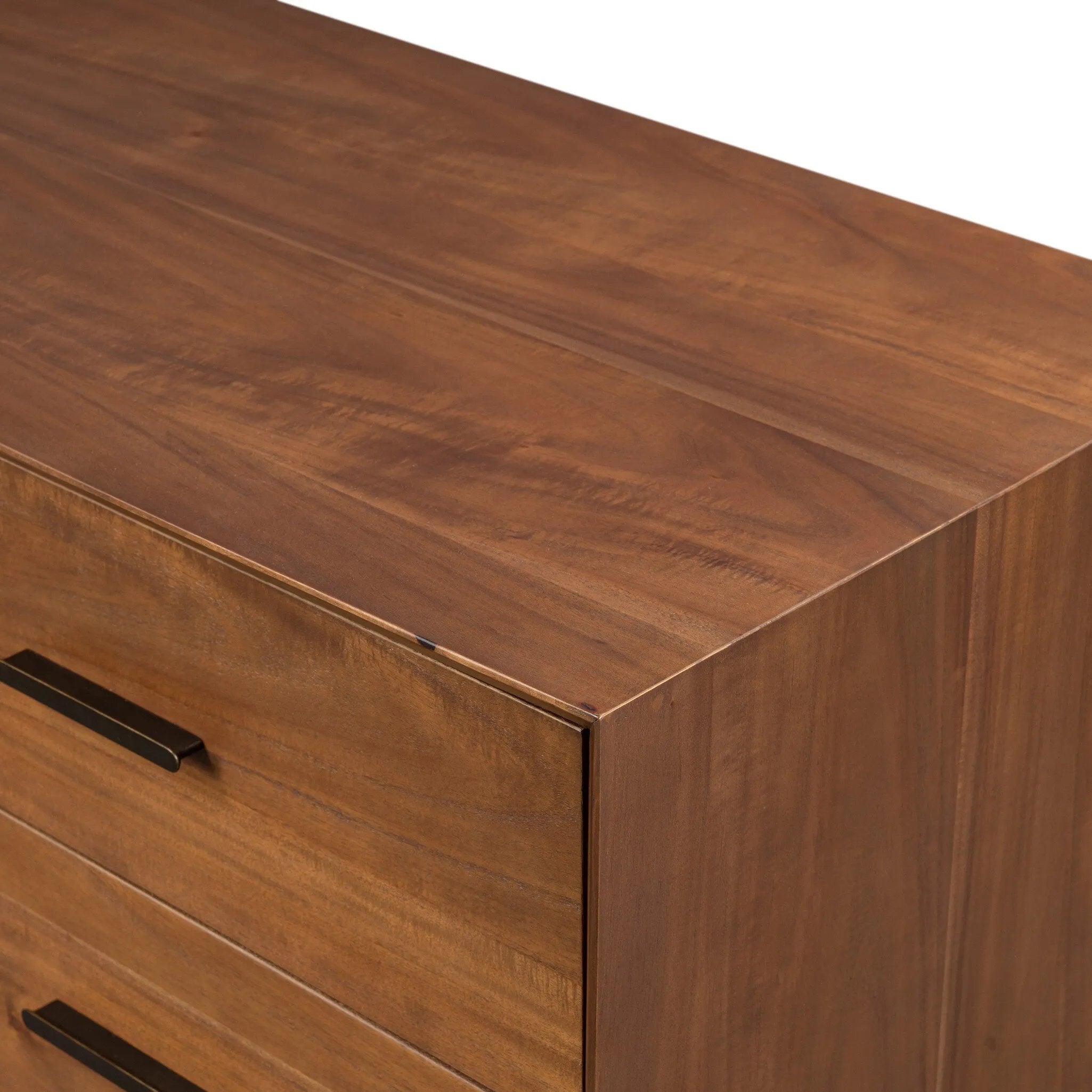 Make a subtle statement in your bedroom with a modern, architectural dresser. An exaggerated pedestal base of solid acacia supports a clean-lined case with nine roomy drawers. Iron hardware in an aged bronze finish the look.As enthusiasts of clean materials at Amethyst, we love the designer inspired Lilas 9 Drawer Dresser - Saddle Tan Veneer. Amethyst Home provides interior design, new home construction design consulting, vintage area rugs, and lighting in the Houston metro area.