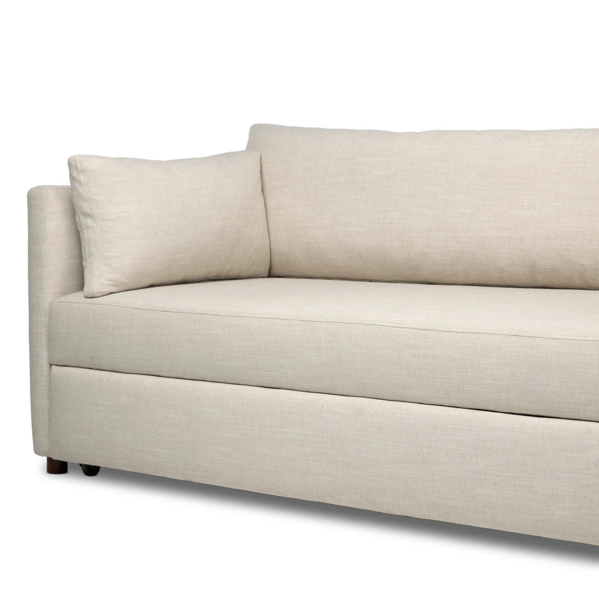 This cleverly designed sleeper sofa hides a Queen-sized sleeping surface within its modern silhouette. With a simple roll-out and counterbalanced mechanism, it effortlessly transforms into a bed, making it a space-saving solution with hidden functionality. Amethyst Home provides interior design, new home construction design consulting, vintage area rugs, and lighting in the Laguna Beach metro area.