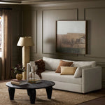 This cleverly designed sleeper sofa hides a Queen-sized sleeping surface within its modern silhouette. With a simple roll-out and counterbalanced mechanism, it effortlessly transforms into a bed, making it a space-saving solution with hidden functionality. Amethyst Home provides interior design, new home construction design consulting, vintage area rugs, and lighting in the Miami metro area.