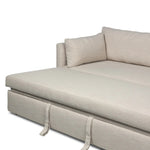 This cleverly designed sleeper sofa hides a Queen-sized sleeping surface within its modern silhouette. With a simple roll-out and counterbalanced mechanism, it effortlessly transforms into a bed, making it a space-saving solution with hidden functionality. Amethyst Home provides interior design, new home construction design consulting, vintage area rugs, and lighting in the Omaha metro area.