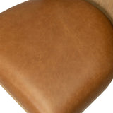 The barrel back dining chair, refreshed. Light oak shapes an armless frame and curved rear legs that almost appear to flow into the seat back. A comfy seat is upholstered in chestnut top-grain leather, while reeding details on the back create a sense of perception play. Amethyst Home provides interior design, new home construction design consulting, vintage area rugs, and lighting in the Newport Beach metro area.