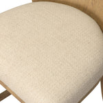 The barrel back counter stool, refreshed. Light oak shapes an armless frame and curved rear legs that almost appear to flow into the seat back. A comfy seat is upholstered in high-performance fabric, while reeding details create a sense of perception play. Amethyst Home provides interior design, new home construction design consulting, vintage area rugs, and lighting in the Nashville metro area.
