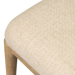 The barrel back counter stool, refreshed. Light oak shapes an armless frame and curved rear legs that almost appear to flow into the seat back. A comfy seat is upholstered in high-performance fabric, while reeding details create a sense of perception play. Amethyst Home provides interior design, new home construction design consulting, vintage area rugs, and lighting in the Seattle metro area.