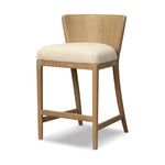 The barrel back counter stool, refreshed. Light oak shapes an armless frame and curved rear legs that almost appear to flow into the seat back. A comfy seat is upholstered in high-performance fabric, while reeding details create a sense of perception play. Amethyst Home provides interior design, new home construction design consulting, vintage area rugs, and lighting in the Washington metro area.