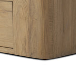 A clean, wide storage style crafted of aged natural oak brings a Brutalist look to any room. Plenty of open shelving offers endless options for favorite books and treasures, while a lower push-latch drawer finishes the look Amethyst Home provides interior design, new home construction design consulting, vintage area rugs, and lighting in the Boston metro area.