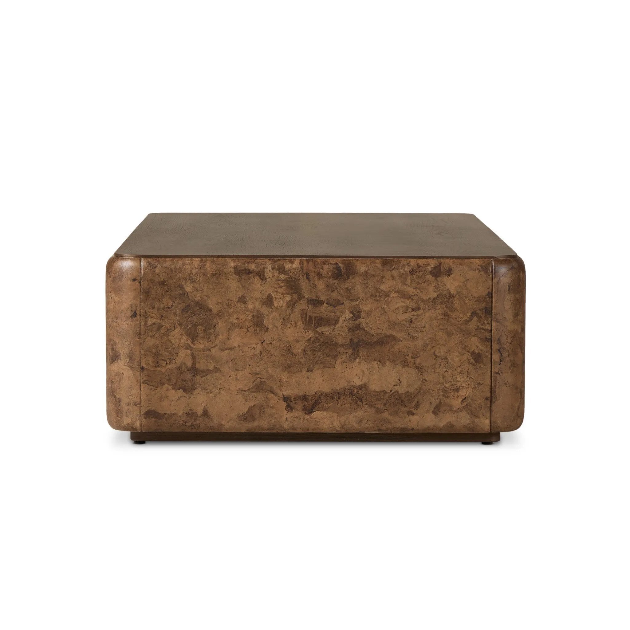 Thick oak veneer and dark paper fiber pair to shape a softened rectangle coffee table, with beautiful natural movement on the sides.As enthusiasts of natural style at Amethyst, we love the designer inspired Lola Coffee Table - Chestnut Oak Veneer. This item pairs well with other brands such as Surya and is perfect for loft homes Amethyst Home provides interior design, new home construction design consulting, vintage area rugs, and lighting in the Scottsdale metro area.
