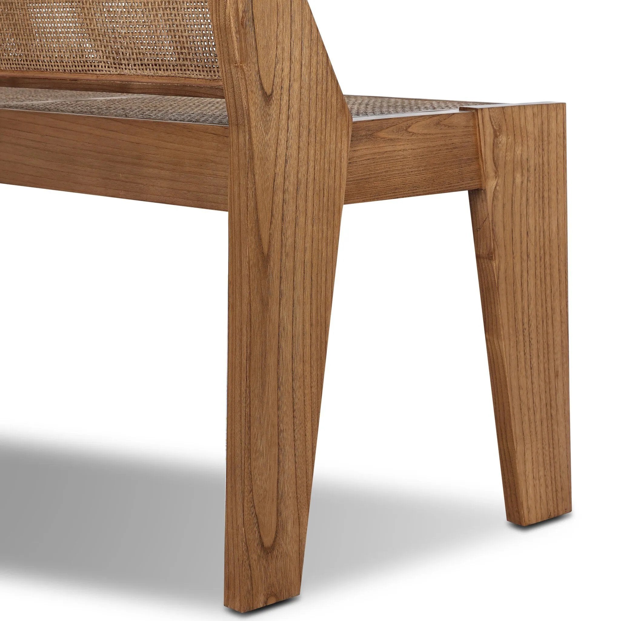 A fresh take on late designer Pierre Jeanneret's iconic seating styles. Our design updates the classic look with a coastal feel, pairing woven cane seating with toasted sungkai frame.As lovers of clean design at Amethyst, we love the nature inspired Lutz Accent Bench - Toasted Sungkai. Amethyst Home provides interior design, new home construction design consulting, vintage area rugs, and lighting in the Newport Beach metro area.