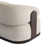 A playful outdoor chair silhouette with a 360 swivel base. The yolk-shaped back is framed by sleek metal accents, adding visual contrast to the exploded boucle upholstery on the thick seat cushion and curved back. Cover or store inside during inclement weather and when not in use. Amethyst Home provides interior design, new home construction design consulting, vintage area rugs, and lighting in the Des Moines metro area.