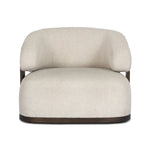 A playful outdoor chair silhouette with a 360 swivel base. The yolk-shaped back is framed by sleek metal accents, adding visual contrast to the exploded boucle upholstery on the thick seat cushion and curved back. Cover or store inside during inclement weather and when not in use. Amethyst Home provides interior design, new home construction design consulting, vintage area rugs, and lighting in the Newport Beach metro area.