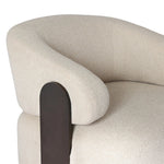 A playful outdoor chair silhouette with a 360 swivel base. The yolk-shaped back is framed by sleek metal accents, adding visual contrast to the exploded boucle upholstery on the thick seat cushion and curved back. Cover or store inside during inclement weather and when not in use. Amethyst Home provides interior design, new home construction design consulting, vintage area rugs, and lighting in the San Diego metro area.