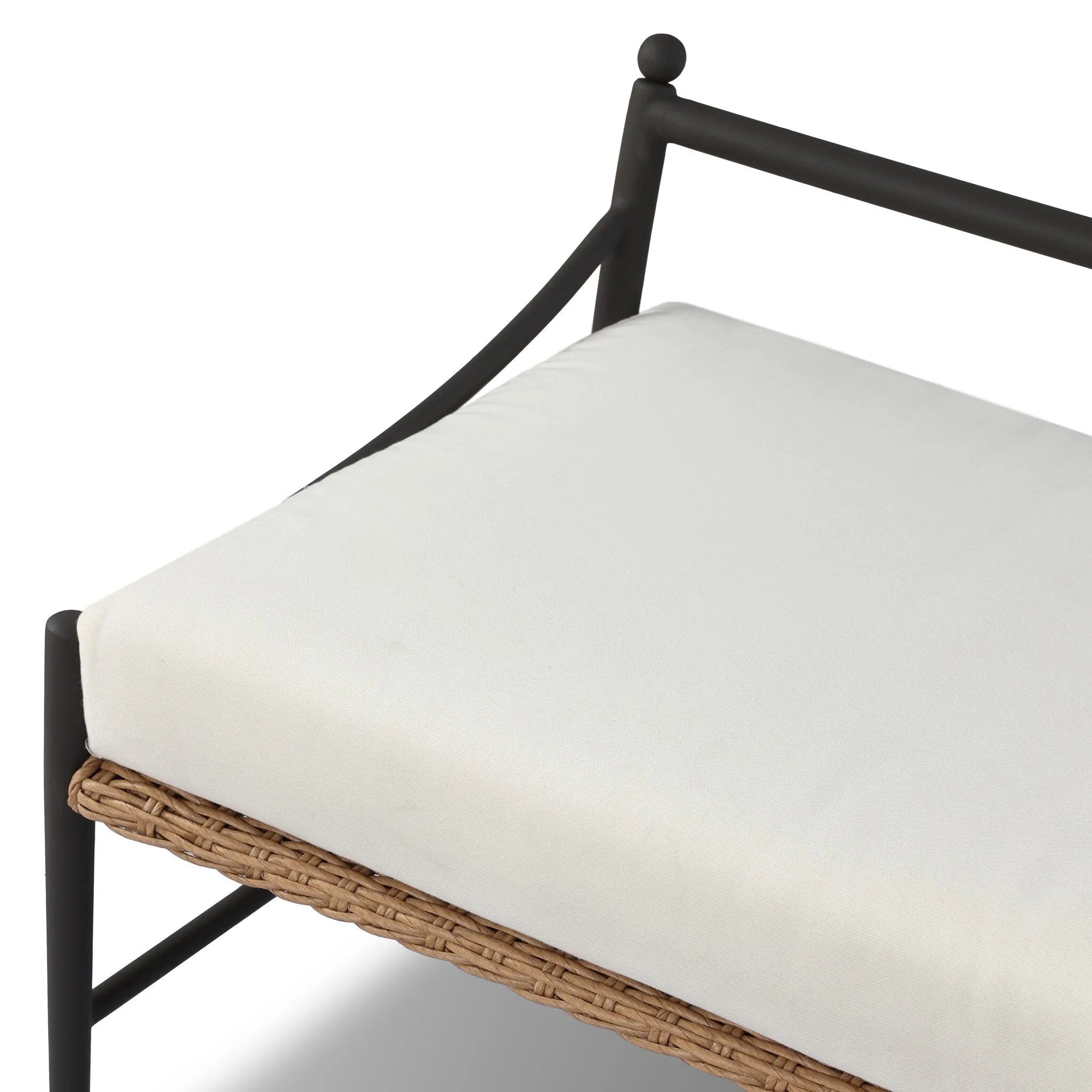 A modern take on traditional weaving patterns centers this outdoor dining bench. Subtly arched metal framing details and a relaxed knife-edge seat cushion invite softness. Cover or store inside during inclement weather and when not in use. A design collaboration by Amber Lewis and Four Hands. Amethyst Home provides interior design, new home construction design consulting, vintage area rugs, and lighting in the Los Angeles metro area.
