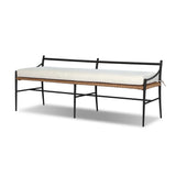 A modern take on traditional weaving patterns centers this outdoor dining bench. Subtly arched metal framing details and a relaxed knife-edge seat cushion invite softness. Cover or store inside during inclement weather and when not in use. A design collaboration by Amber Lewis and Four Hands. Amethyst Home provides interior design, new home construction design consulting, vintage area rugs, and lighting in the Winter Garden metro area.
