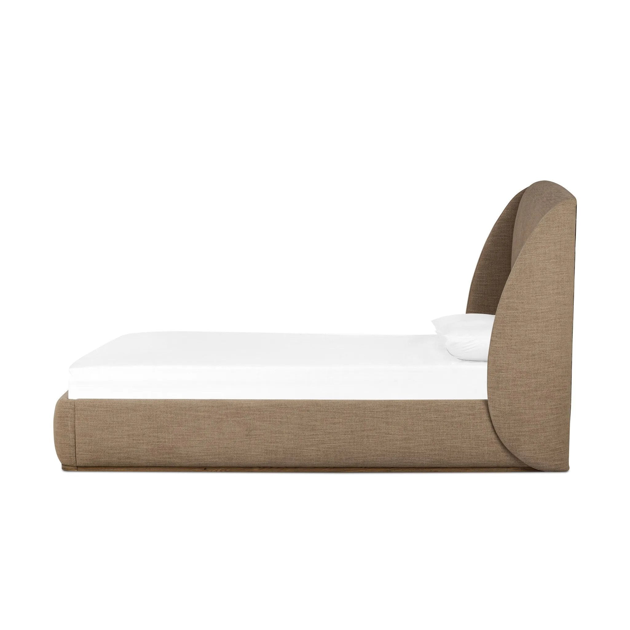Featuring Maeve Laken Taupe Upholstered Bed by Four Hands at Amethyst Home. Clean lines meet contoured curves for a timeless bedroom look. A petal-shaped shelter overlaps side rails for a unique,  comforting silhouette. Fully upholstered in a versatile taupe that complements a wide range of color palettes. Overall Dimensions: Queen:
70.50"w x 88.50"d x 48.50". Amethyst Home provides interior design, new home construction design consulting, vintage area rugs, and lighting in the Houston metro area.