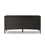 A cleanly shaped six-drawer dresser is crafted from smoked black oak, highlighting the wood's natural grain. Roomy drawers offer plenty of space for bedroom storage, while the slim, tapered legs give the piece a subtle lift, creating a grounded look Amethyst Home provides interior design, new home construction design consulting, vintage area rugs, and lighting in the Boston metro area.