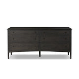 A cleanly shaped six-drawer dresser is crafted from smoked black oak, highlighting the wood's natural grain. Roomy drawers offer plenty of space for bedroom storage, while the slim, tapered legs give the piece a subtle lift, creating a grounded look Amethyst Home provides interior design, new home construction design consulting, vintage area rugs, and lighting in the Boston metro area.