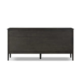 A cleanly shaped six-drawer dresser is crafted from smoked black oak, highlighting the wood's natural grain. Roomy drawers offer plenty of space for bedroom storage, while the slim, tapered legs give the piece a subtle lift, creating a grounded look Amethyst Home provides interior design, new home construction design consulting, vintage area rugs, and lighting in the Kansas City metro area.
