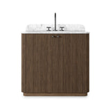 This bath vanity is simply shaped to allow the reeded oak to shine. Rounded corners bring softness and allow for a seamless finish, complemented by tapered knob hardware. Finished with a bath-safe sealant for moisture resistance. Designed to accommodate 8”-widespread faucets and standard-size hardware for easy customization. Amethyst Home provides interior design, new home construction design consulting, vintage area rugs, and lighting in the Boston metro area.