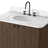 This bath vanity is simply shaped to allow the reeded oak to shine. Rounded corners bring softness and allow for a seamless finish, complemented by tapered knob hardware. Finished with a bath-safe sealant for moisture resistance. Designed to accommodate 8”-widespread faucets and standard-size hardware for easy customization. Amethyst Home provides interior design, new home construction design consulting, vintage area rugs, and lighting in the Nashville metro area.