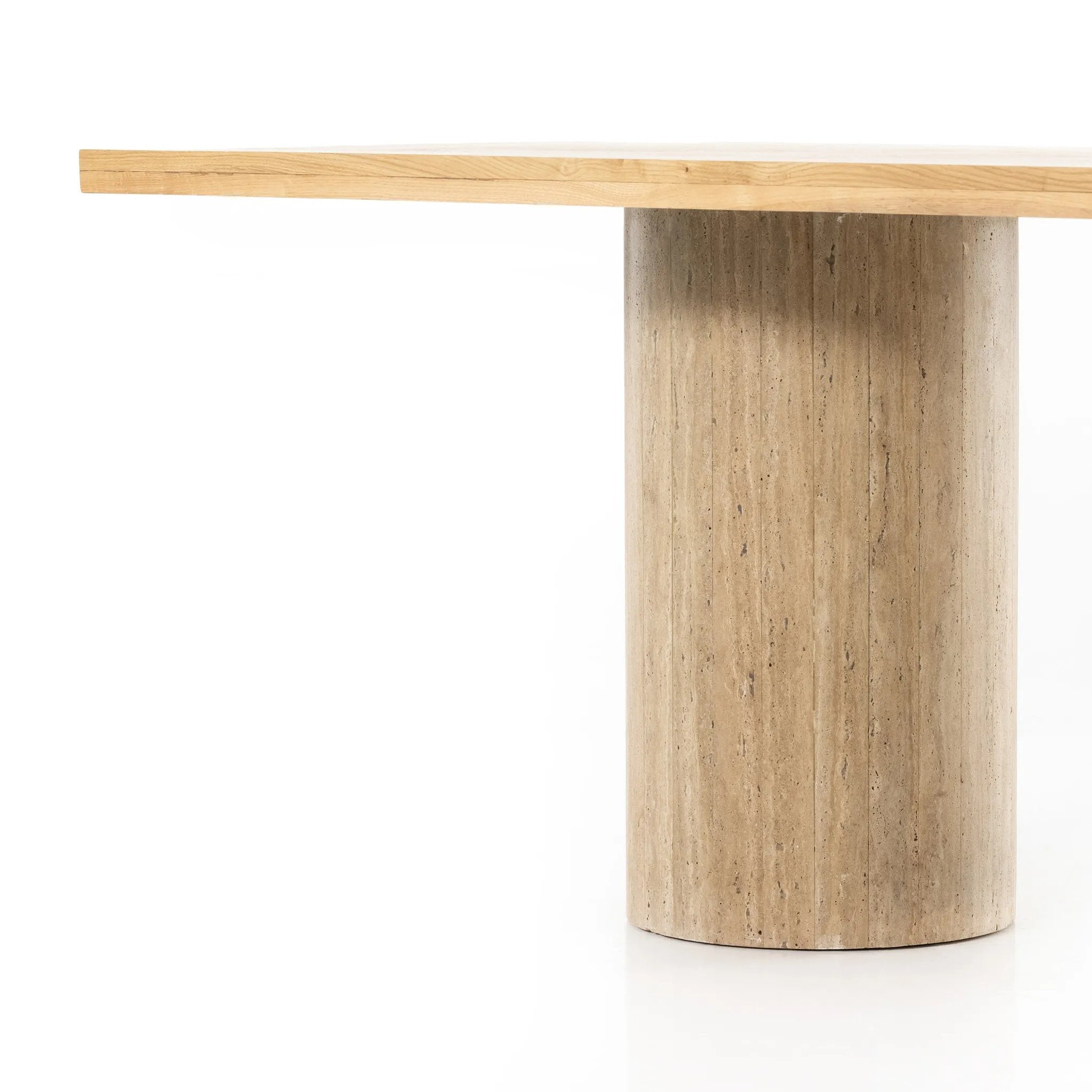 Make a mixed material statement. Cylindrical legs of solid travertine provide a dramatically scaled base for a rectangular tabletop of solid natural oak, for a fresh twist on organic Seventies styling. Seats six comfortably Amethyst Home provides interior design, new home construction design consulting, vintage area rugs, and lighting in the Alpharetta metro area.